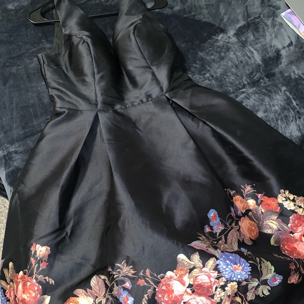 Beautiful black prom dress with floral lining!